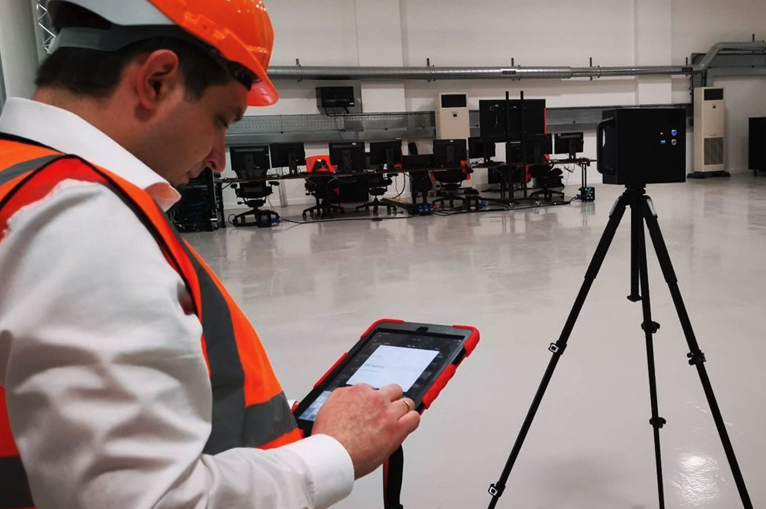 Project manager conducting site analysis and feasibility study on an iPad Project manager conducting site analysis and feasibility study on an iPad
